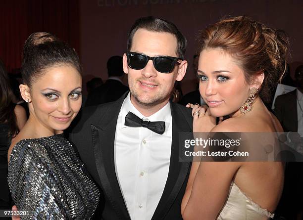 Nicole Richie, musician Joel Madden and musician Miley Cyrus attends the 18th Annual Elton John AIDS Foundation Oscar party held at Pacific Design...