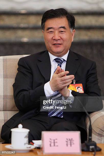 Member of the Political Bureau of the CPC Central Committee and Secretary of the CPC Guangdong Committee Wang Yang attends the Guangdong group...