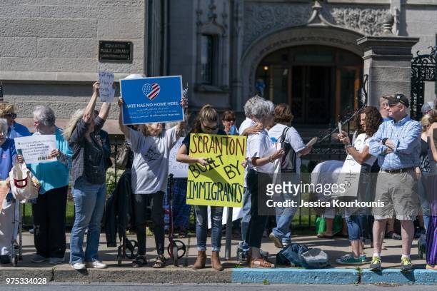 Protesters demonstrate before U.S. Attorney General Jeff Sessions delivers remarks on immigration and law enforcement actions at Lackawanna College...