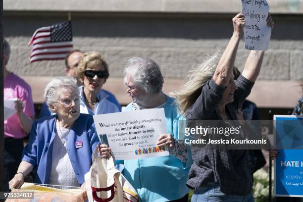 Protesters demonstrate before U.S. Attorney General Jeff Sessions delivers remarks on immigration and law enforcement actions at Lackawanna College...