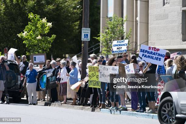 Protesters demonstrate before U.S. Attorney General Jeff Sessions delivers remarks on immigration and law enforcement actions at Lackawanna College...