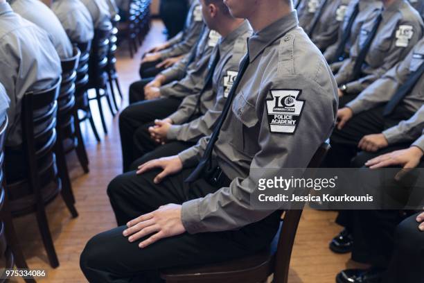 Lackawanna Police Academy cadets wait to hear U.S. Attorney General Jeff Sessions deliver remarks on immigration and law enforcement actions on June...
