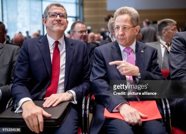May 2018, Germany, Berlin: Hans-Georg Maassen , President of the Bundesamtes fuer Verfassungsschutz , and Andrew Parker, Director-General of the...