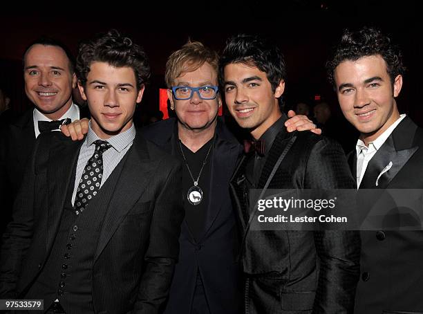 David Furnish, musician Nick Jonas, musician sir Elton John, musician Joe Jonas and musician Kevin Jonas attend the 18th Annual Elton John AIDS...