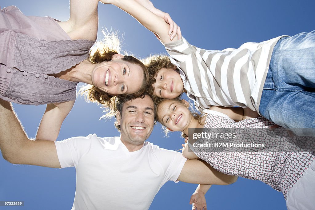 Family standing in huddle