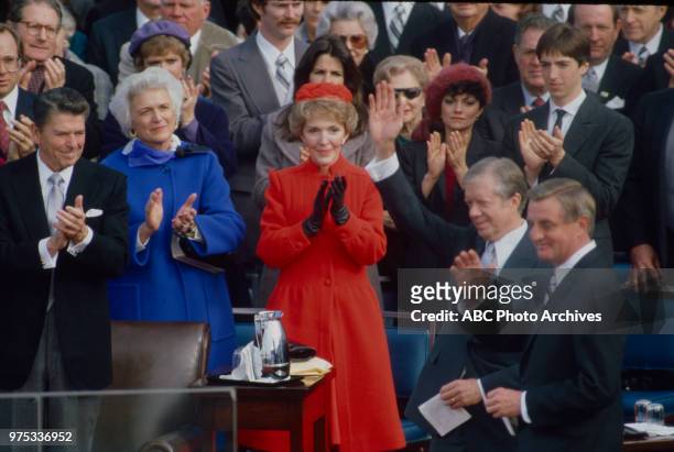 Washington, DC Ronald Reagan, Barbara Bush, Nancy Reagan, Jimmy Carter, Walter Mondale at Reagan's first inauguration, United States Capitol in...