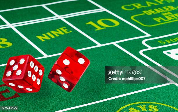 rolling seven - red dice stock pictures, royalty-free photos & images