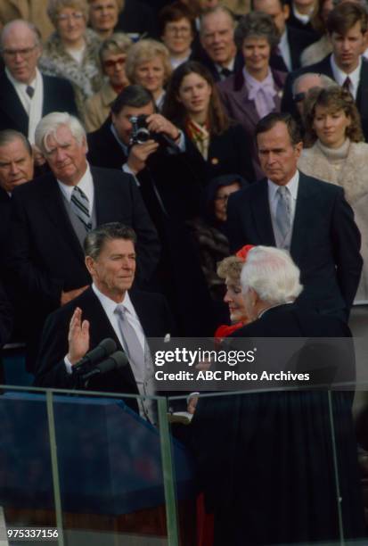 Washington, DC Tip O'Neill, George HW Bush, Ronald Reagan, Nancy Reagan, Reagan being sworn in during Reagan's first inauguration, United States...