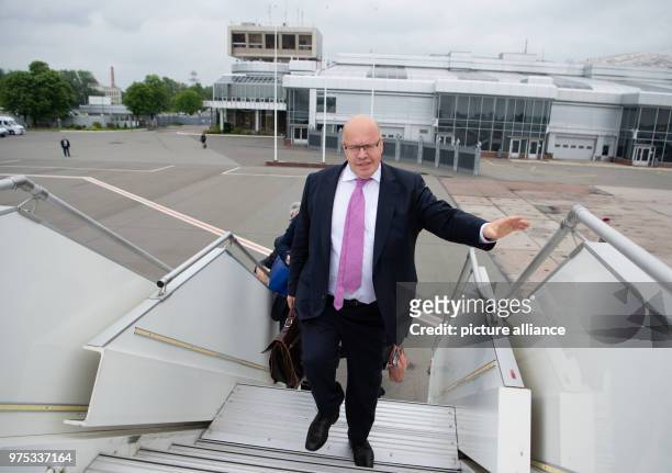 May 2018, Ukraine, Kiev: Peter Altmaier of the Christian Democratic Union , German Minister for Economic Affairs and Energy, walks up the gangway of...