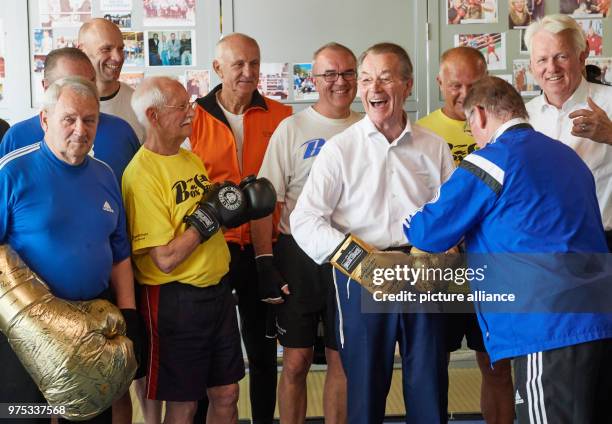 May 2018, Germany, Dortmund: Franz Muentefering , chairman of the Bundesarbeitsgemeinschaft der Senioren-Organisationen laughs with members of the...