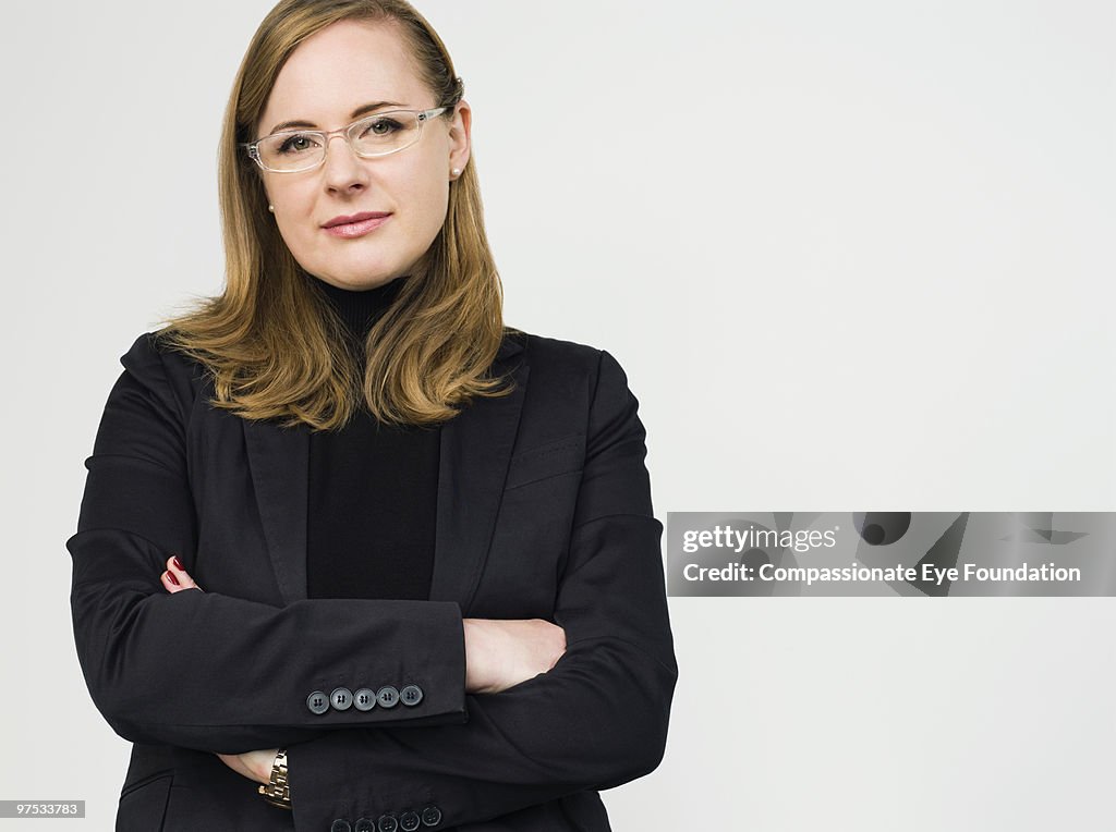 Portrait of woman with crossed arms 