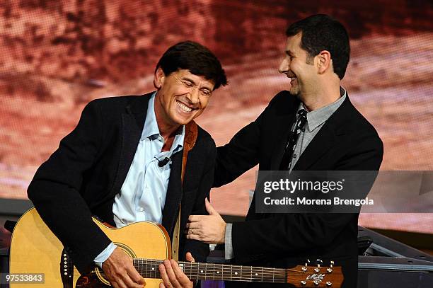 Gianni Morandi and Fabio Fazio during the Italian tv show "Che tempo che fa" on October 19, 2008 in Milan, Italy.