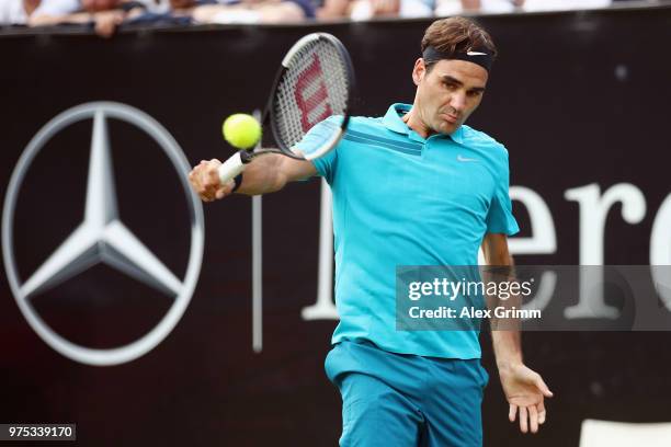 Roger Federer of Switzerland plays a backhand to Guido Pella of Argentina during day 5 of the Mercedes Cup at Tennisclub Weissenhof on June 15, 2018...