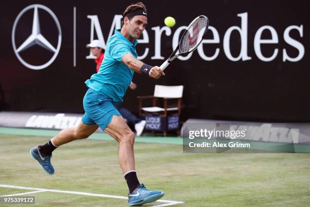 Roger Federer of Switzerland plays a backhand to Guido Pella of Argentina during day 5 of the Mercedes Cup at Tennisclub Weissenhof on June 15, 2018...