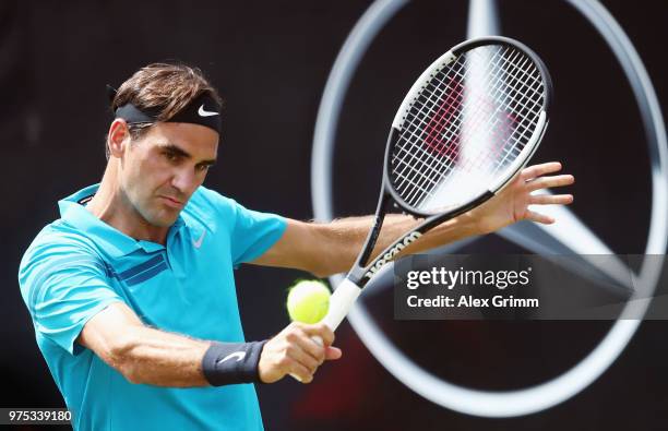 Roger Federer of Switzerland plays a backhand to Guido Pella of Argentina during day 5 of the Mercedes Cup at Tennisclub Weissenhof on June 15, 2018...