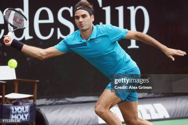 Roger Federer of Switzerland plays a forehand to Guido Pella of Argentina during day 5 of the Mercedes Cup at Tennisclub Weissenhof on June 15, 2018...