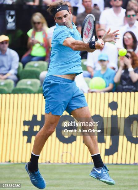 Roger Federer of Switzerland plays a forehand to Guido Pella of Argentina during day 5 of the Mercedes Cup at Tennisclub Weissenhof on June 15, 2018...