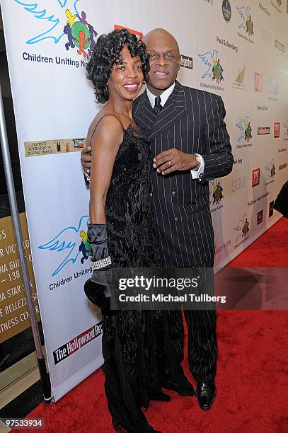 Comedian Michael Colyar arrives with wife Brooks Colyar at the 11th Annual Children Uniting Nations Oscar Celebration, held at the Beverly Hilton...