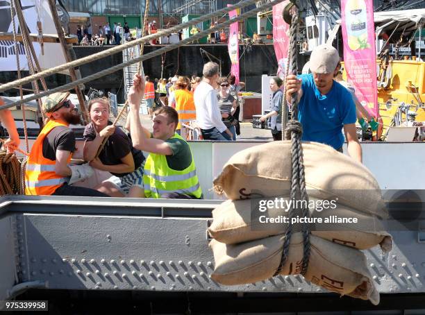 May 2018, Hamburg, Germany: Workers unloading the Eco-Sailing boat "Avontuur" at the Port Museum. The ship has delivered approximately 17 tonnes of...