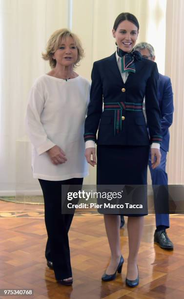 Alberta Ferrtti and a model attend the press conference to unveil new Alitalia uniforms created by Alberta Ferretti on June 15, 2018 in Milan, Italy.