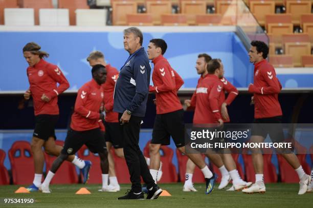 Denmark's coach Age Hareide looks on as he leads a training session of Denmark's national football team at the Mordovia Arena in Saransk, on June 15,...