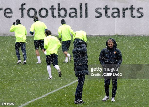 Barcelona's coach Pep Guardiola attends a training session at Ciutat Esportiva Joan Gamper in Barcelona, on March 8, 2010. AFP PHOTO / JOSEP LAGO