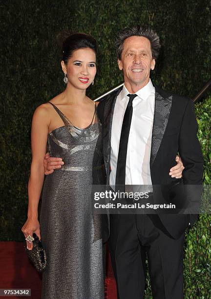 Chau-Giang Thi Nguyen and Producer Brian Grazer arrive at the 2010 Vanity Fair Oscar Party hosted by Graydon Carter held at Sunset Tower on March 7,...