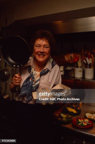 Julia Child cooking.