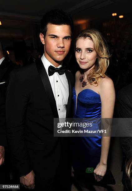 Actors Taylor Lautner and Emma Roberts attend the 2010 Vanity Fair Oscar Party hosted by Graydon Carter at the Sunset Tower Hotel on March 7, 2010 in...