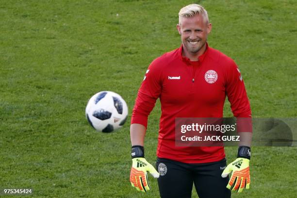 Denmark's goalkeeper Kasper Schmeichel controls the ball as he takes part in a training session of Denmark's national football team at the Mordovia...