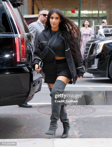 Kim Kardashian, Jonathan Cheban and North West go on a ice cream date with a young friend on June 14, 2018 in New York City.