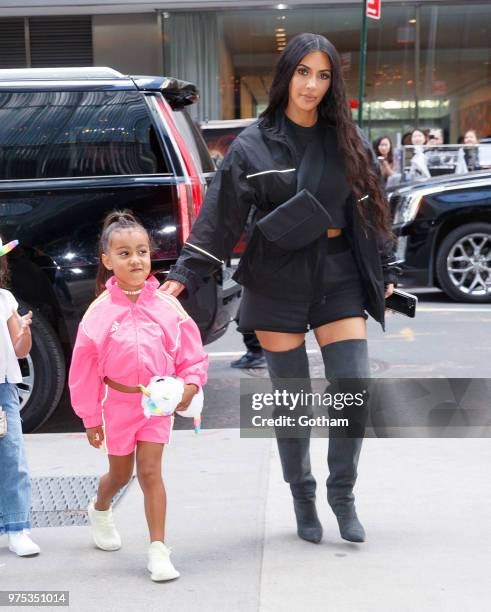 Kim Kardashian, Jonathan Cheban and North West go on a ice cream date with a young friend on June 14, 2018 in New York City.