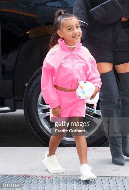 Kim Kardashian, Jonathan Cheban and North West go on a ice cream date with a young friend on June 14, 2018 in New York City.
