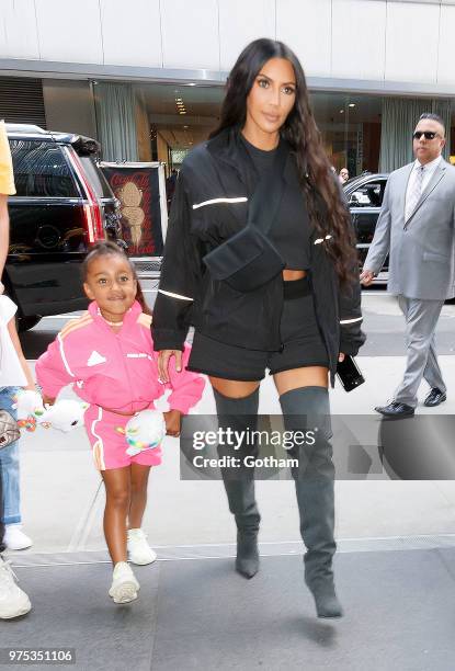 Kim Kardashian, Jonathan Cheban and North West go on a ice cream date with a young friend on June 14, 2018 in New York City.