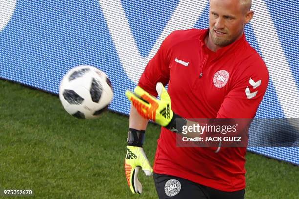 Denmark's goalkeeper Kasper Schmeichel controls the ball as he takes part in a training session of Denmark's national football team at the Mordovia...