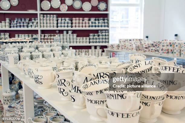 Febuary 2018, Great Britain, Stoke-on-Trent: Hand-painted cups by the company Emma Bridgewater are stacked on a table. On the occasion of the wedding...