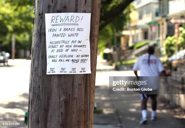Sign posted by Colin Trimmer hangs on a telephone pole in Medford, MA on June 14, 2018. Trimmer plastered hand-written signs on and around Boston...