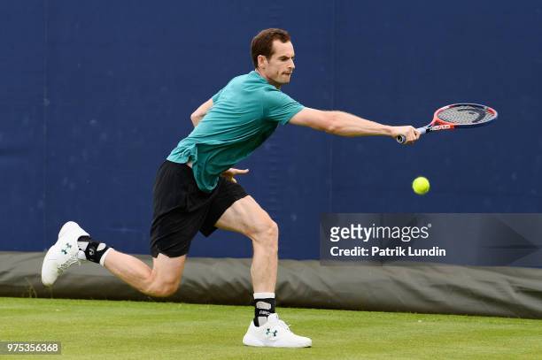Andy Murray of Great Britain hits a backhand in practice during preview Day 3 of the Fever-Tree Championships at Queens Club on June 15, 2018 in...