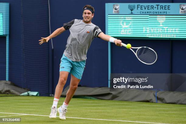 Cameron Norrie of Great Britain reaches for a forehand in practice during preview Day 3 of the Fever-Tree Championships at Queens Club on June 15,...