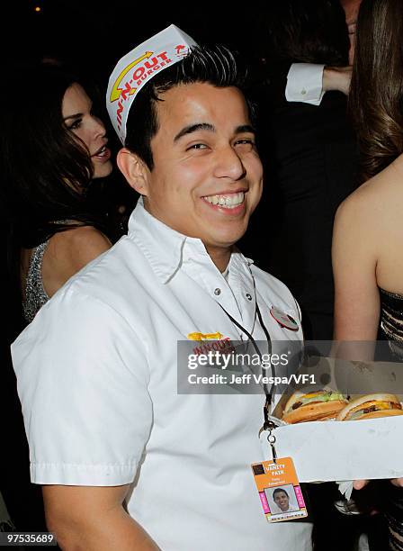 Waiter servers cheese burgers during the 2010 Vanity Fair Oscar Party hosted by Graydon Carter at the Sunset Tower Hotel on March 7, 2010 in West...
