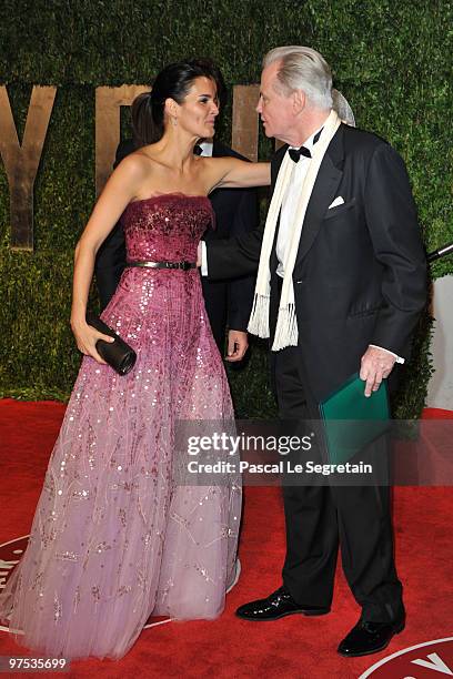 Actress Angie Harmon and actor Jon Voight arrive at the 2010 Vanity Fair Oscar Party hosted by Graydon Carter held at Sunset Tower on March 7, 2010...