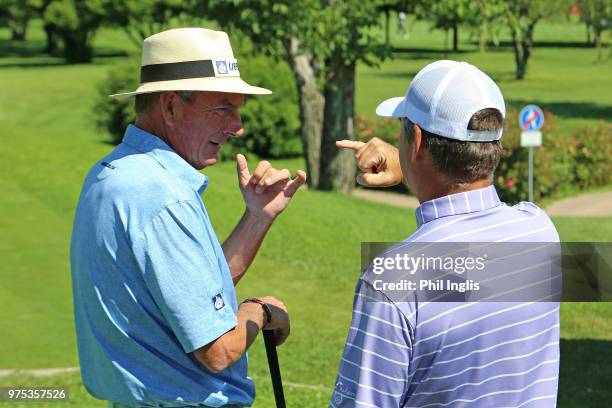 Mark Mouland of Wales and Clark Dennis of United States in discussion during the first round of the 2018 Senior Italian Open presented by Villaverde...