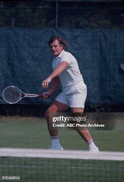 Ted Kennedy playing tennis.