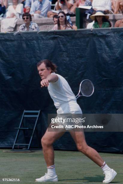 Ted Kennedy playing tennis.
