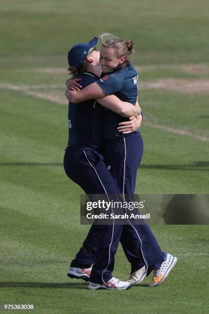 England Women bowler Laura Marsh celebrates with captain Heather Knight after taking the wicket of Marizanne Kapp of South Africa Women during the...