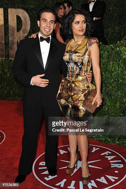 Olympic Speed Skater Apollo Anton Ohno and Actress Salma Hayek arrive at the 2010 Vanity Fair Oscar Party hosted by Graydon Carter held at Sunset...