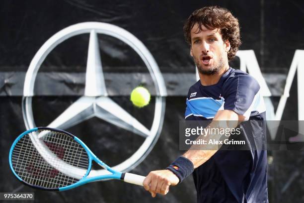 Feliciano Lopez of Spain plays a backhand to Nick Kyrgios of Australia during day 5 of the Mercedes Cup at Tennisclub Weissenhof on June 15, 2018 in...