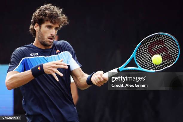 Feliciano Lopez of Spain plays a forehand to Nick Kyrgios of Australia during day 5 of the Mercedes Cup at Tennisclub Weissenhof on June 15, 2018 in...