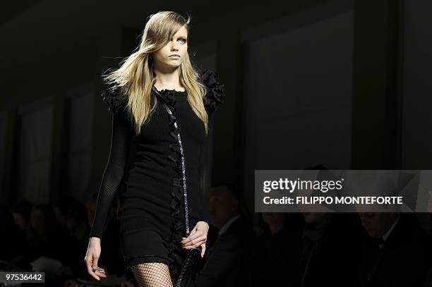 Model displays a creation as part of Bottega Veneta Fall-Winter 2010-2011 ready-to-wear collection on February 27, 2010 during the Women's fashion...