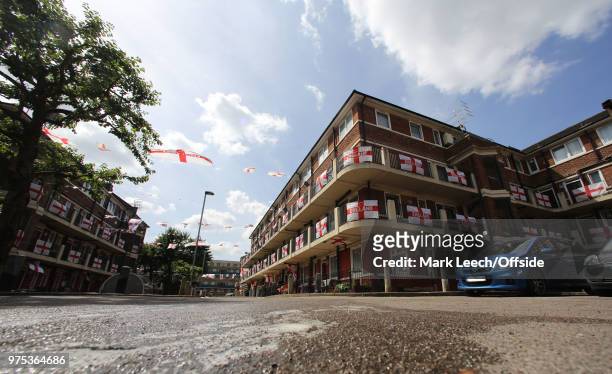 Residents decorate their properties within the Kirby Estate in Bermondsey with St George flags and bunting of show support for England at the FIFA...